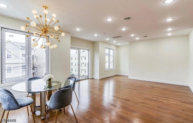 376 21st Street Irvington, NJ 07111 - Photo 9 of 24 a view of a dining room with furniture window and outside view