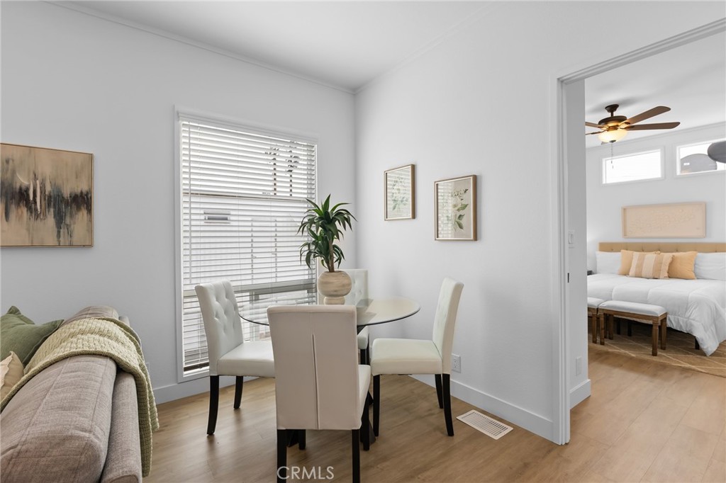455 Judson Street, Unit 9 Redlands, CA 92374 - Photo 11 of 21 a view of a dining room with furniture window and wooden floor