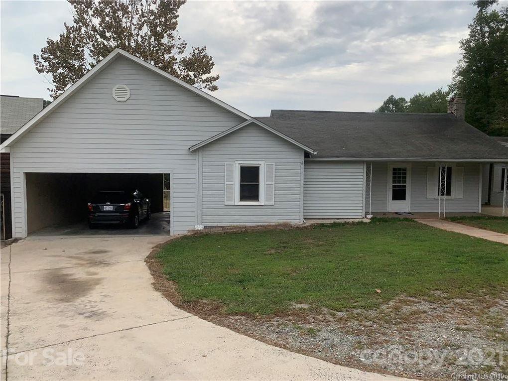 290 John Smith Road Rutherfordton, NC 28139 - Photo 1 of 16 a view of a yard in front view of a house