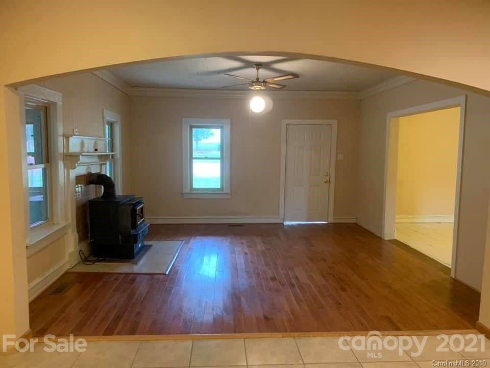 290 John Smith Road Rutherfordton, NC 28139 - Photo 12 of 16 wooden floor in an empty room with a window