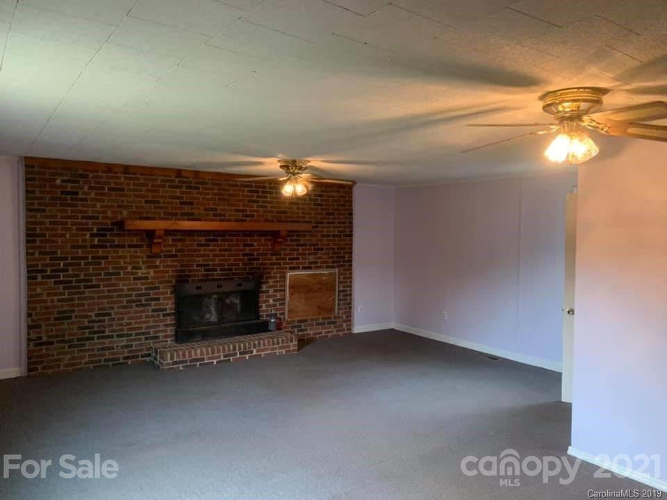 290 John Smith Road Rutherfordton, NC 28139 - Photo 14 of 16 a view of an empty room and fire place