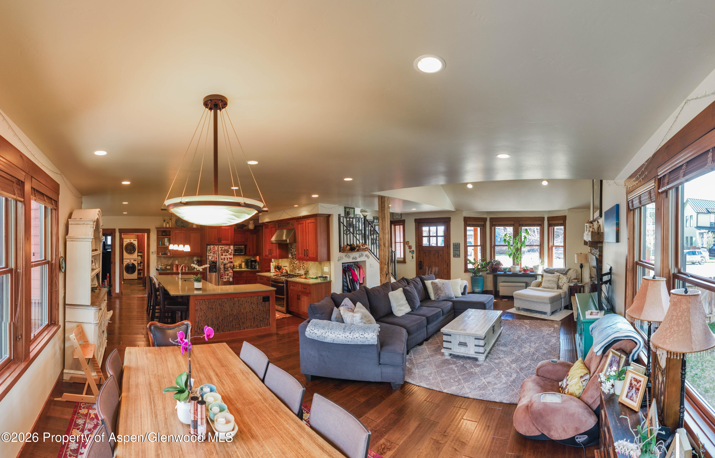 109 Valley Court Basalt, CO 81621 - Photo 14 of 41 a living room with furniture and a chandelier