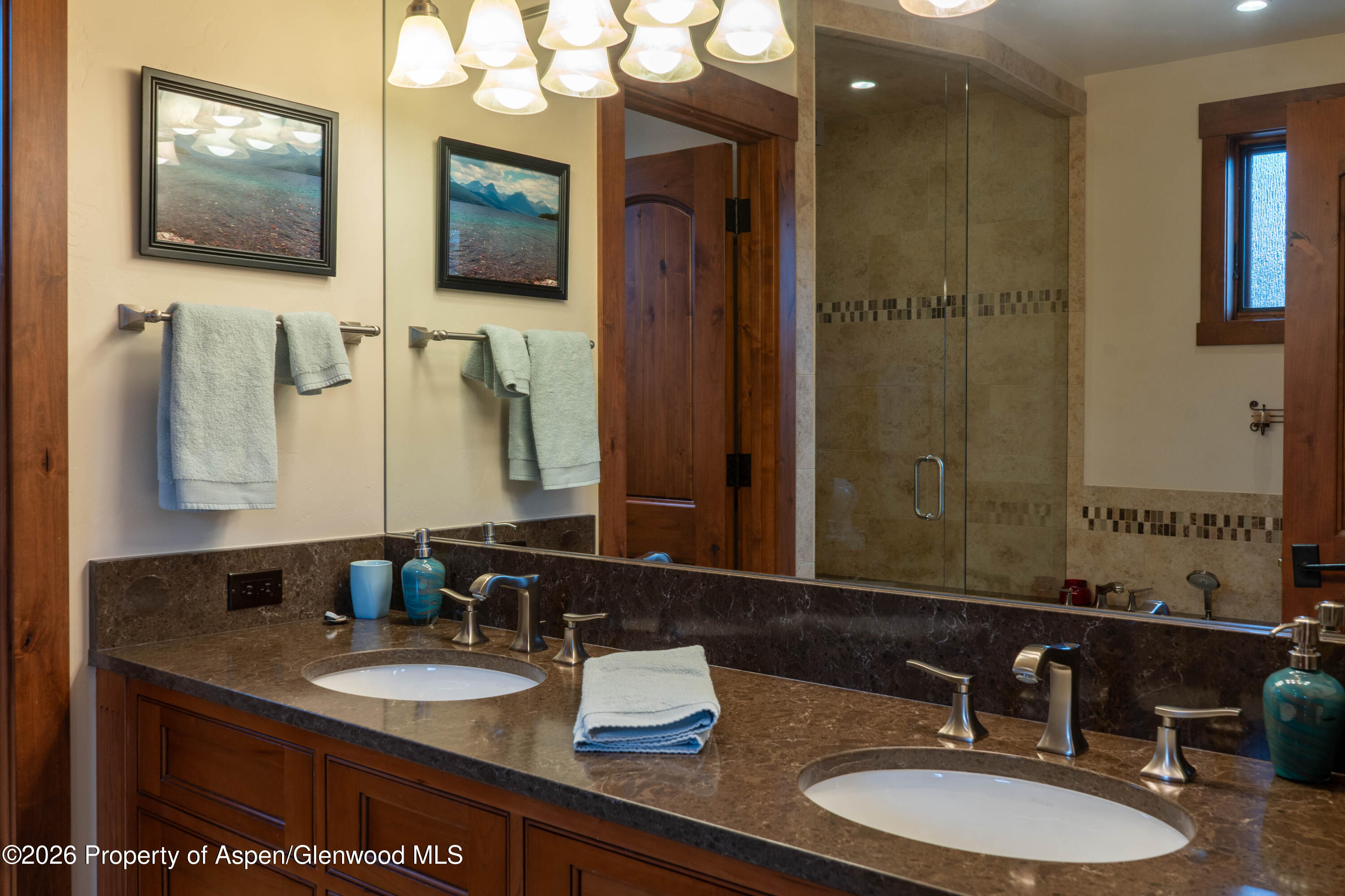 109 Valley Court Basalt, CO 81621 - Photo 22 of 41 a bathroom with a double vanity sink and a mirror