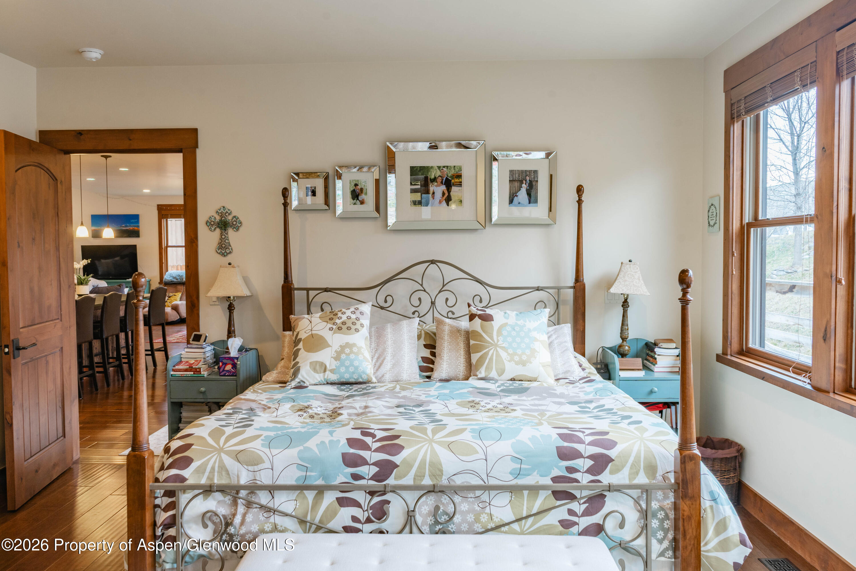 109 Valley Court Basalt, CO 81621 - Photo 24 of 41 a bedroom with a large bed and a large mirror on the dresser
