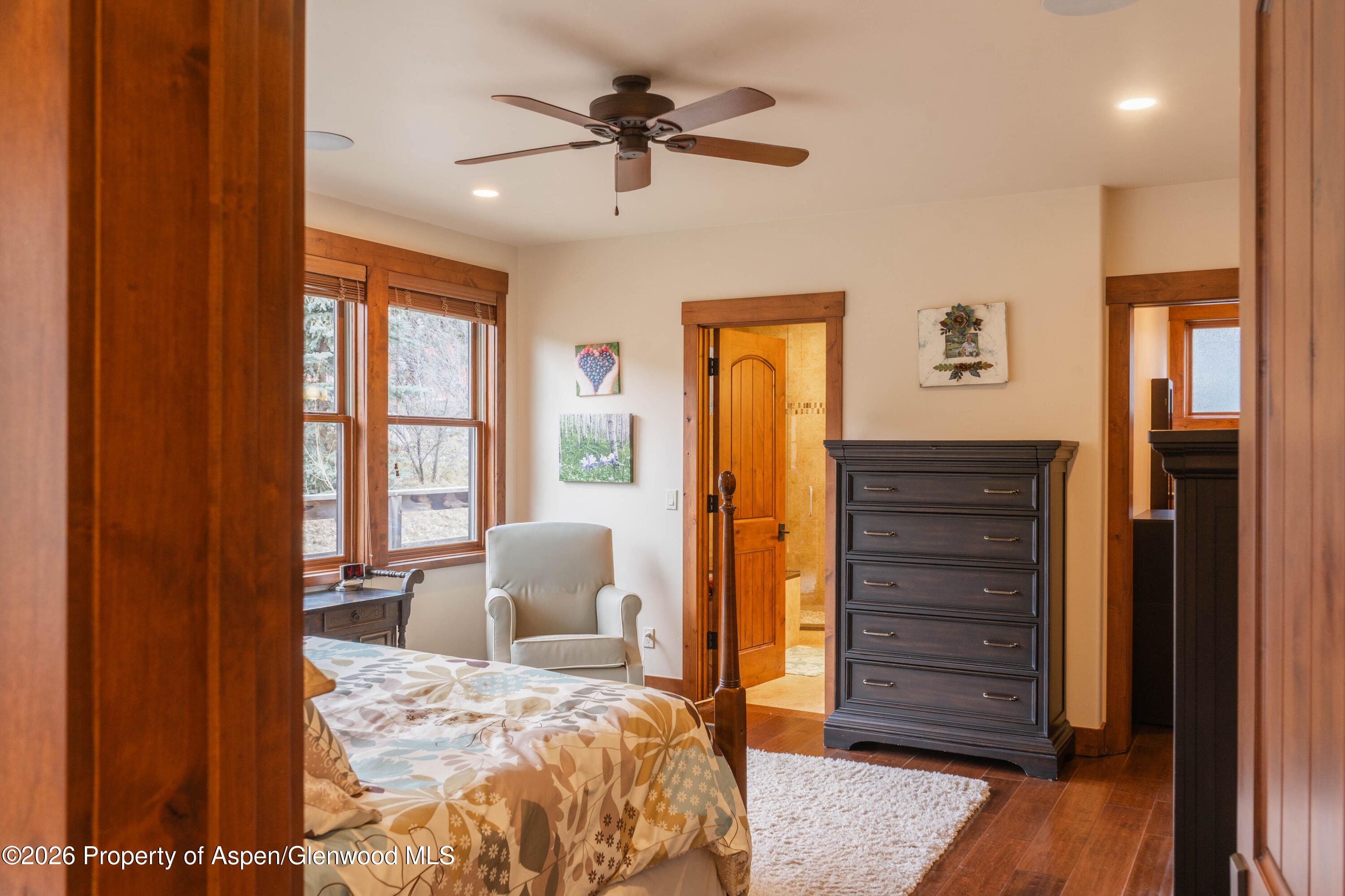 109 Valley Court Basalt, CO 81621 - Photo 25 of 41 a bedroom with a bed and a dresser