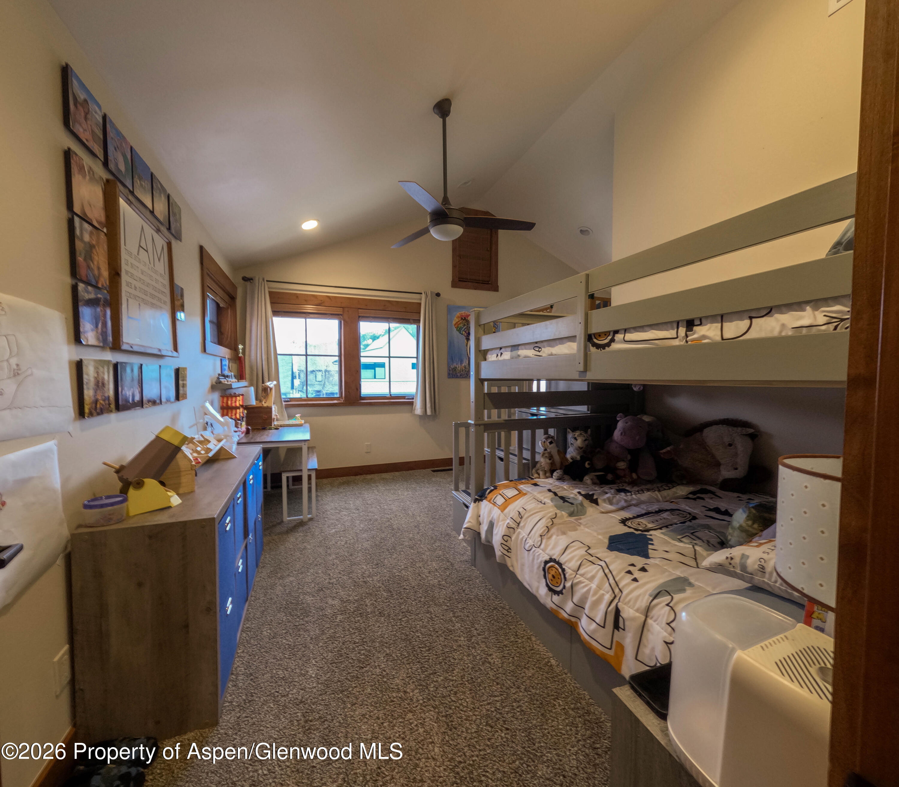 109 Valley Court Basalt, CO 81621 - Photo 27 of 41 a bedroom with furniture and a window