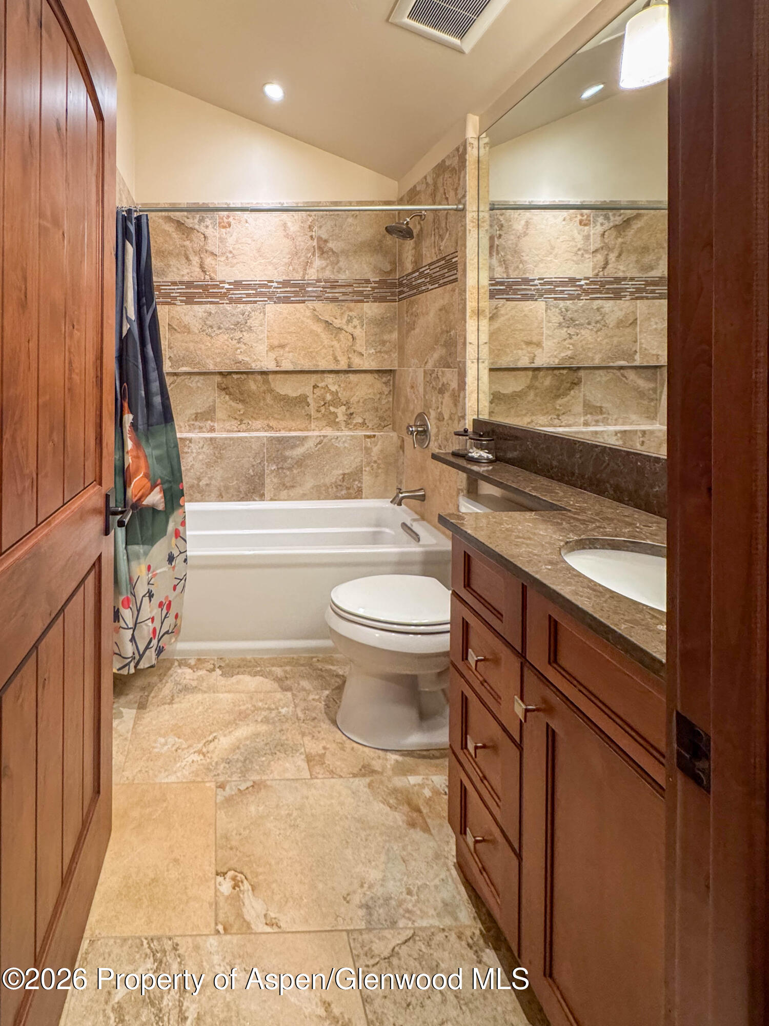109 Valley Court Basalt, CO 81621 - Photo 32 of 41 a bathroom with a granite countertop sink toilet and shower