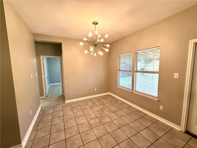 a view of an empty room with window