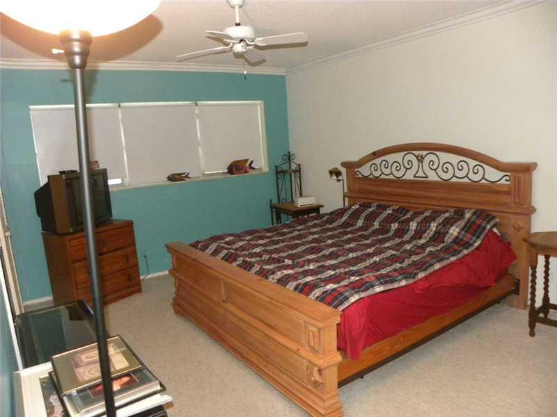 3100 North Course Lane, Unit 502 Pompano Beach, FL 33069 - Photo 6 of 16 Master Bedroom