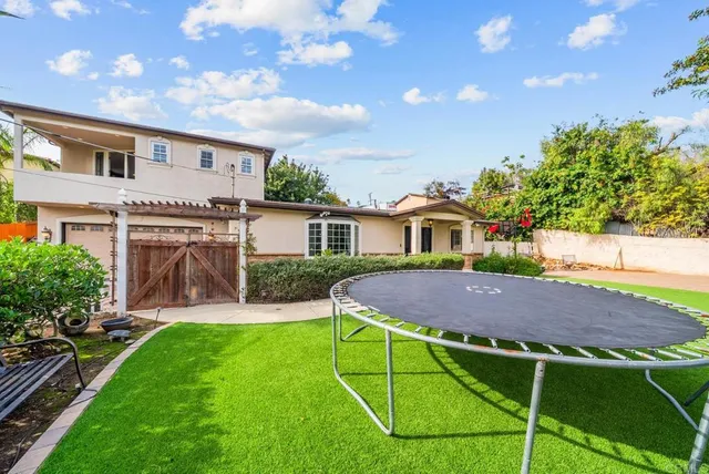 a house view with a garden space