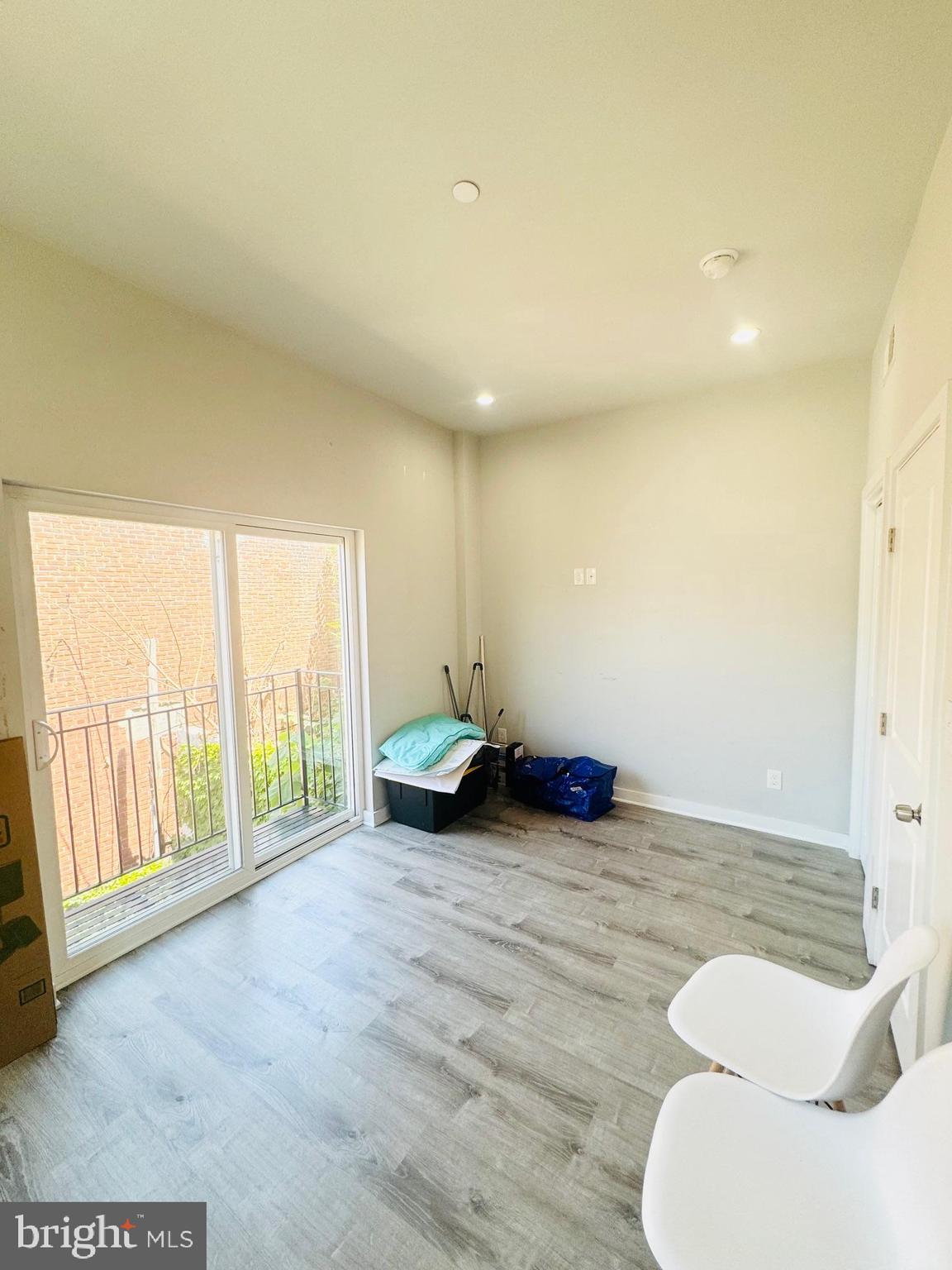 2327 Wharton Street, Unit 2 Philadelphia, PA 19146 - Photo 18 of 19 a view of a room with furniture and a large window