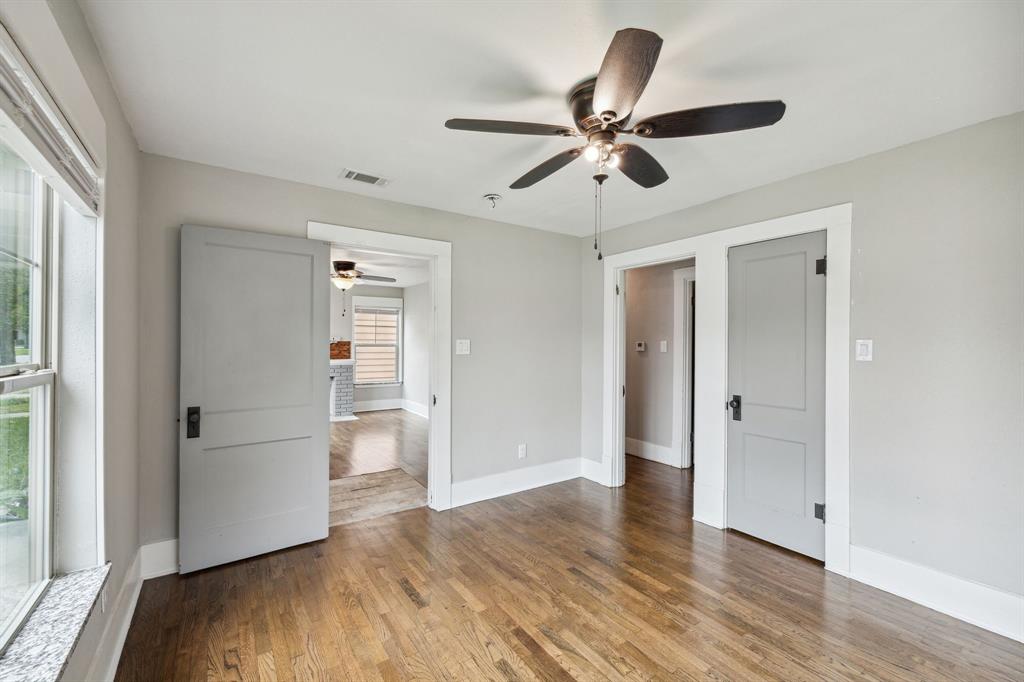 1605 South Walnut Street Sherman, TX 75090 - Photo 14 of 28 a view of empty room with wooden floor and window