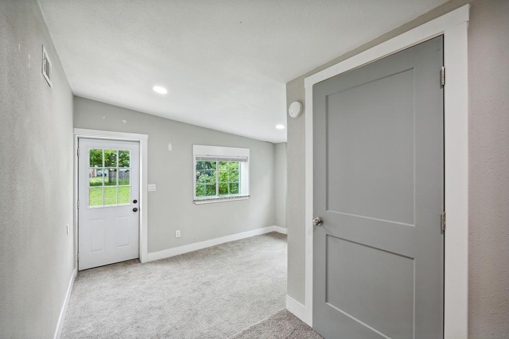 1605 South Walnut Street Sherman, TX 75090 - Photo 18 of 28 a view of an empty room with a window