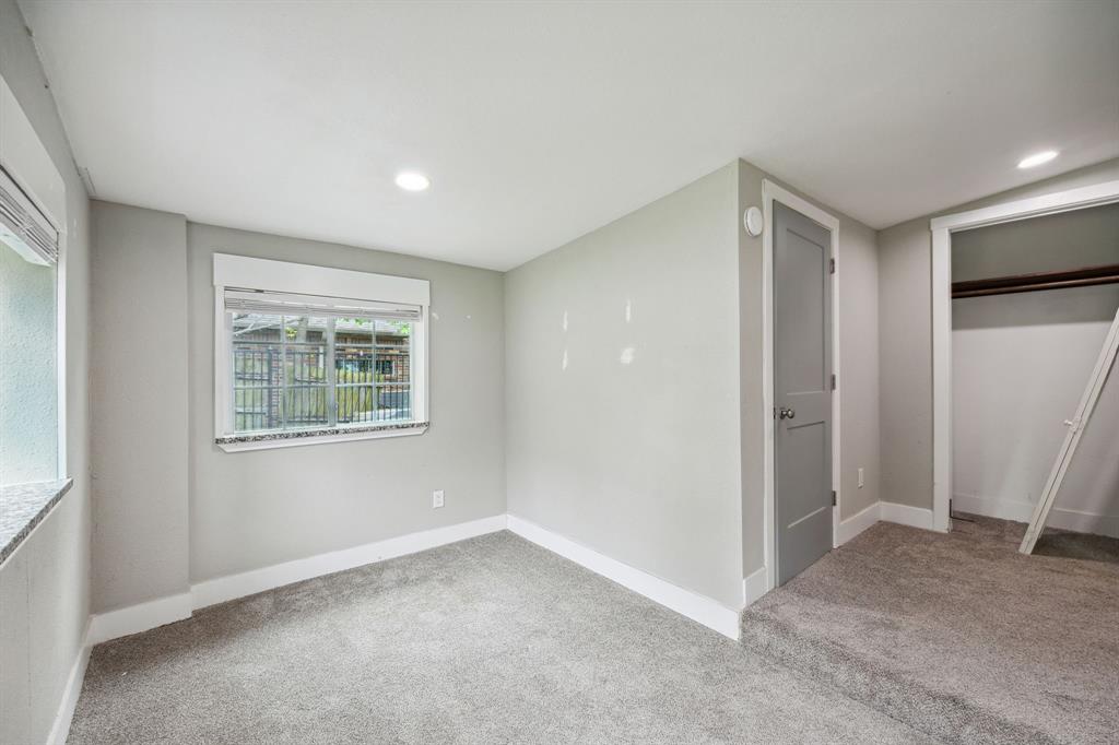 1605 South Walnut Street Sherman, TX 75090 - Photo 19 of 28 a view of an empty room with a window
