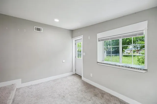 an empty room with a window