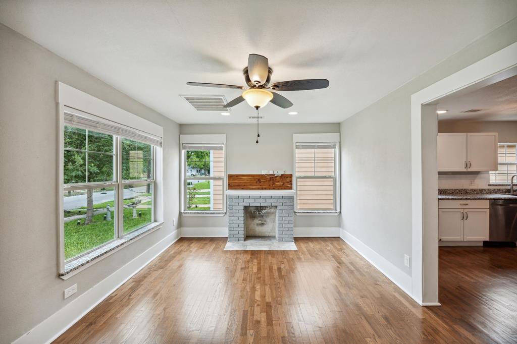1605 South Walnut Street Sherman, TX 75090 - Photo 4 of 28 a living room with furniture and a fireplace