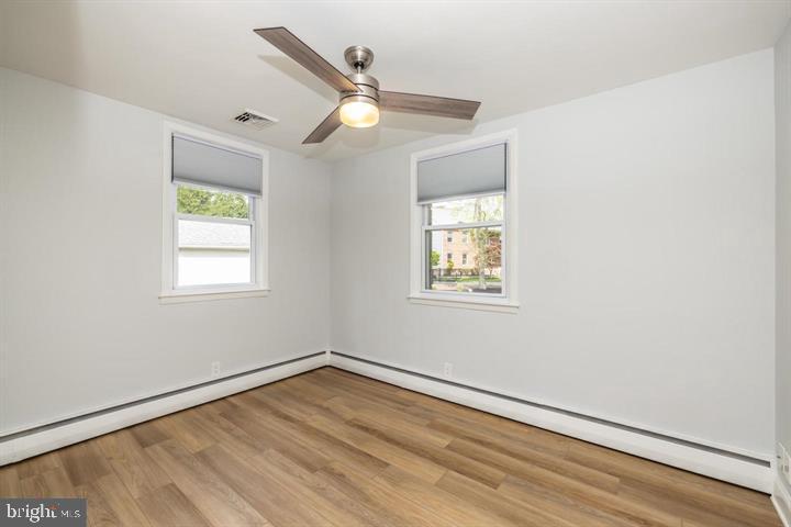 902 Croton Road Wayne, PA 19087 - Photo 19 of 37 wooden floor in an empty room with a window