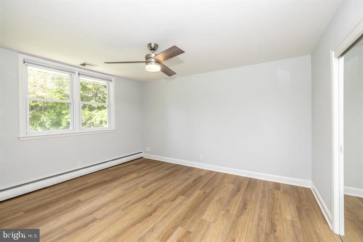 902 Croton Road Wayne, PA 19087 - Photo 25 of 37 wooden floor in an empty room with a window