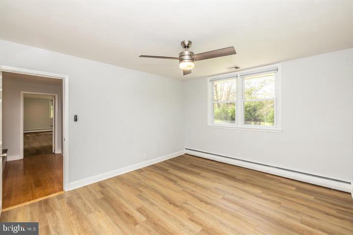 902 Croton Road Wayne, PA 19087 - Photo 27 of 37 wooden floor in an empty room with a window