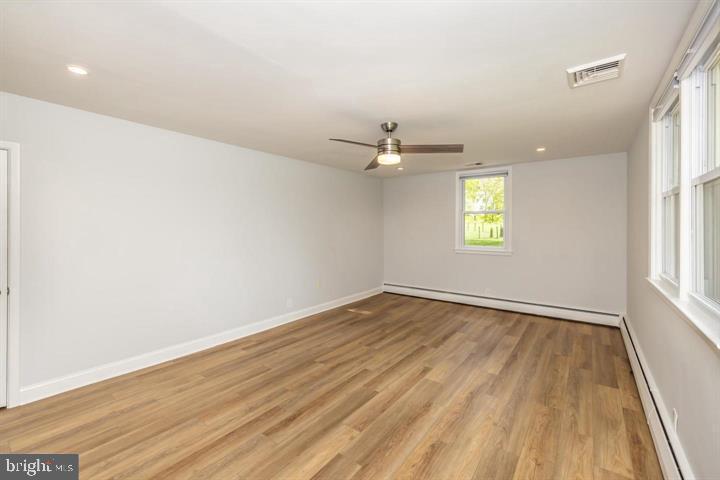 902 Croton Road Wayne, PA 19087 - Photo 31 of 37 wooden floor in an empty room with a window