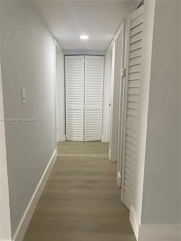 a view of hallway with stairs