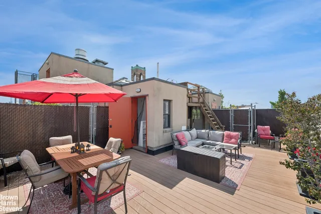 a bathroom with a toilet sink vanity and mirror