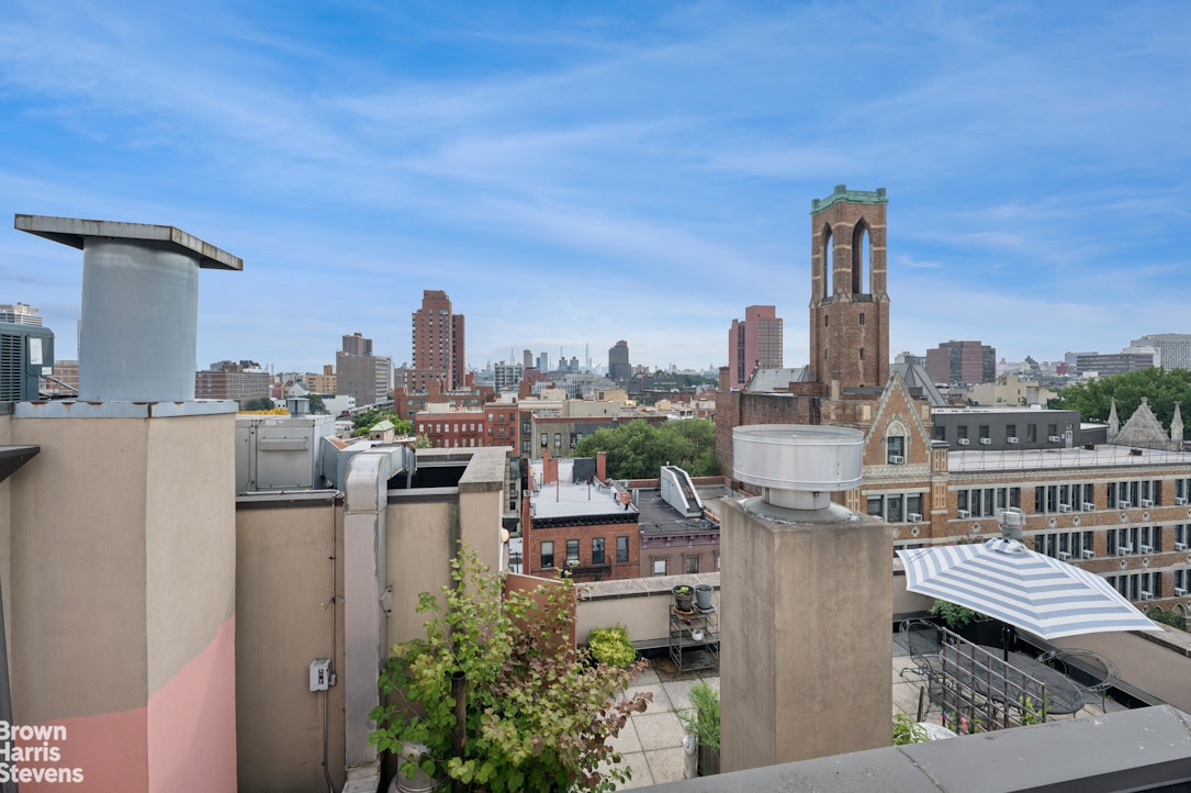 69 East 130th Street, Unit PHB Manhattan, NY 10037 - Photo 12 of 26 a view of a city from a terrace