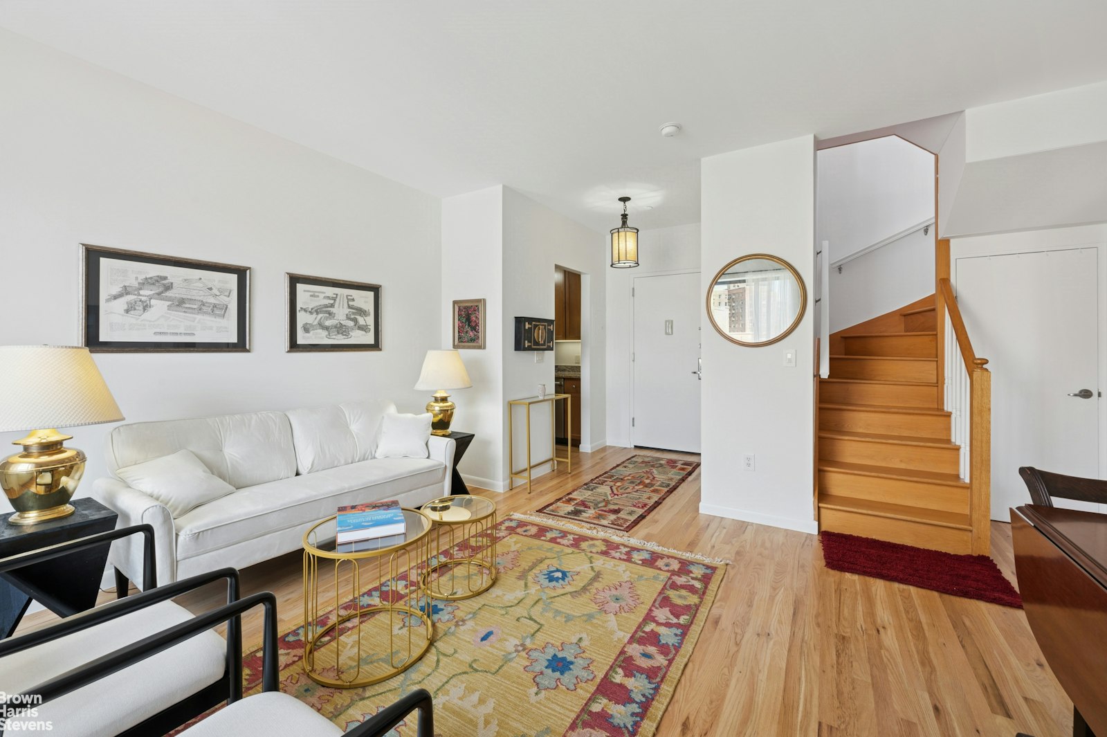 69 East 130th Street, Unit PHB Manhattan, NY 10037 - Photo 21 of 26 a living room with furniture and wooden floor