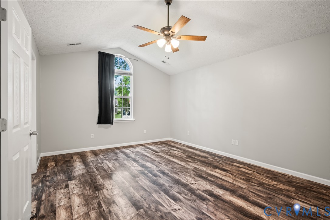 2099 Yacht Club Road Hayes, VA 23072 - Photo 22 of 42 a view of a room with window and ceiling fan