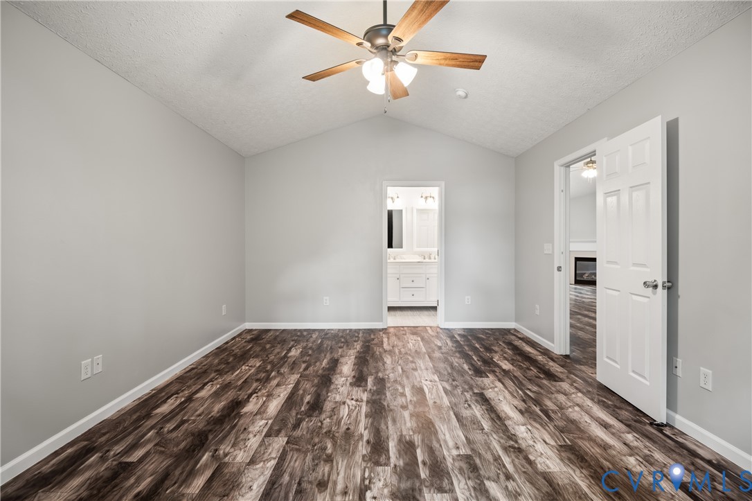 2099 Yacht Club Road Hayes, VA 23072 - Photo 24 of 42 wooden floor in an empty room with a window
