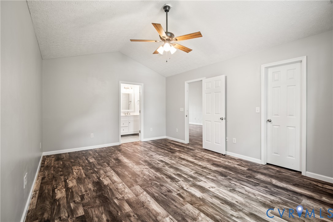 2099 Yacht Club Road Hayes, VA 23072 - Photo 25 of 42 a view of a bedroom with a ceiling fan