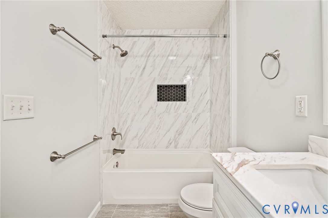 2099 Yacht Club Road Hayes, VA 23072 - Photo 27 of 42 a bathroom with a sink toilet and shower