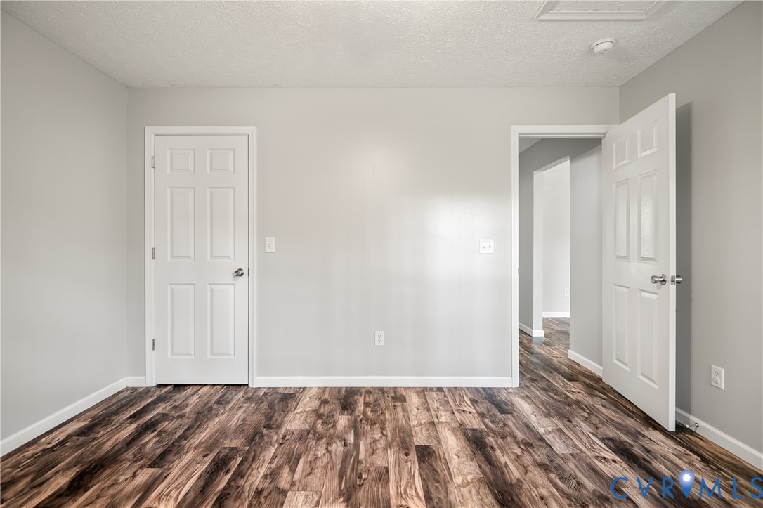 2099 Yacht Club Road Hayes, VA 23072 - Photo 32 of 42 a view of a room with wooden floor and closet