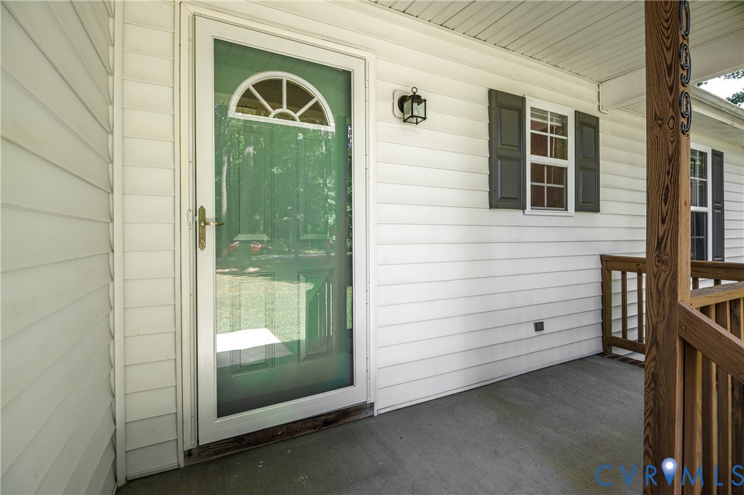 2099 Yacht Club Road Hayes, VA 23072 - Photo 6 of 42 a view of a door and outdoor space