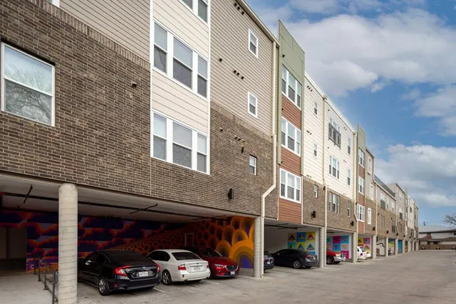 a view of a car park in front of building