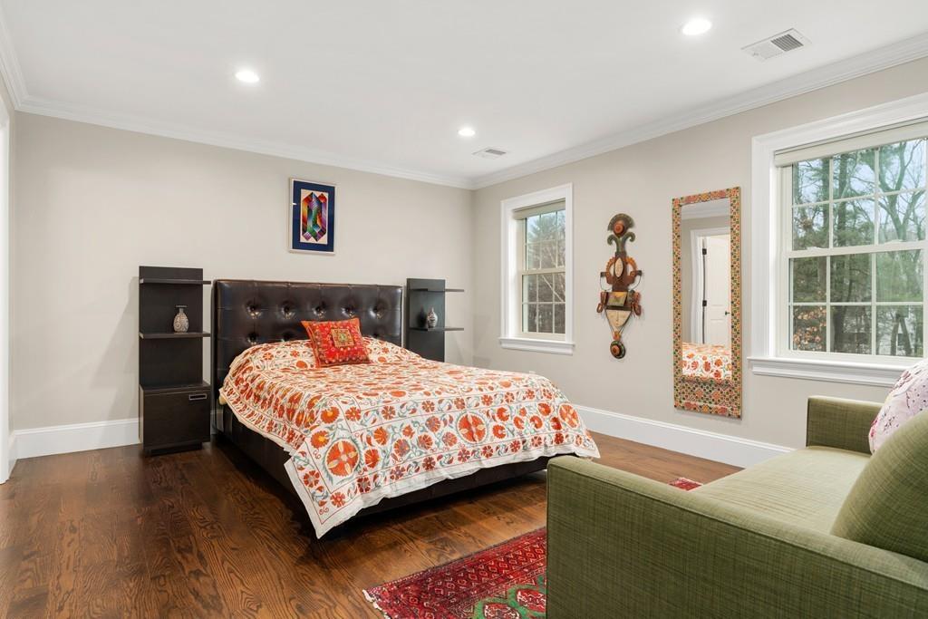 18 Webb Avenue Wellesley, MA 02481 - Photo 13 of 19 a bedroom with a bed and wooden floor