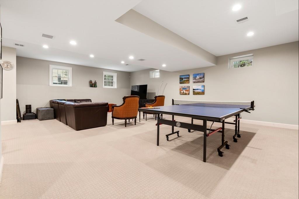 18 Webb Avenue Wellesley, MA 02481 - Photo 15 of 19 a living room with furniture and a rug