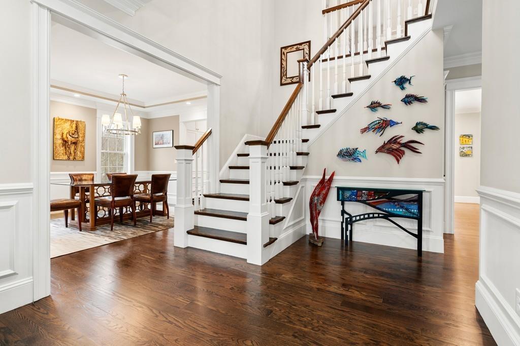 18 Webb Avenue Wellesley, MA 02481 - Photo 2 of 19 a view of entryway and dining room with furniture and wooden floor
