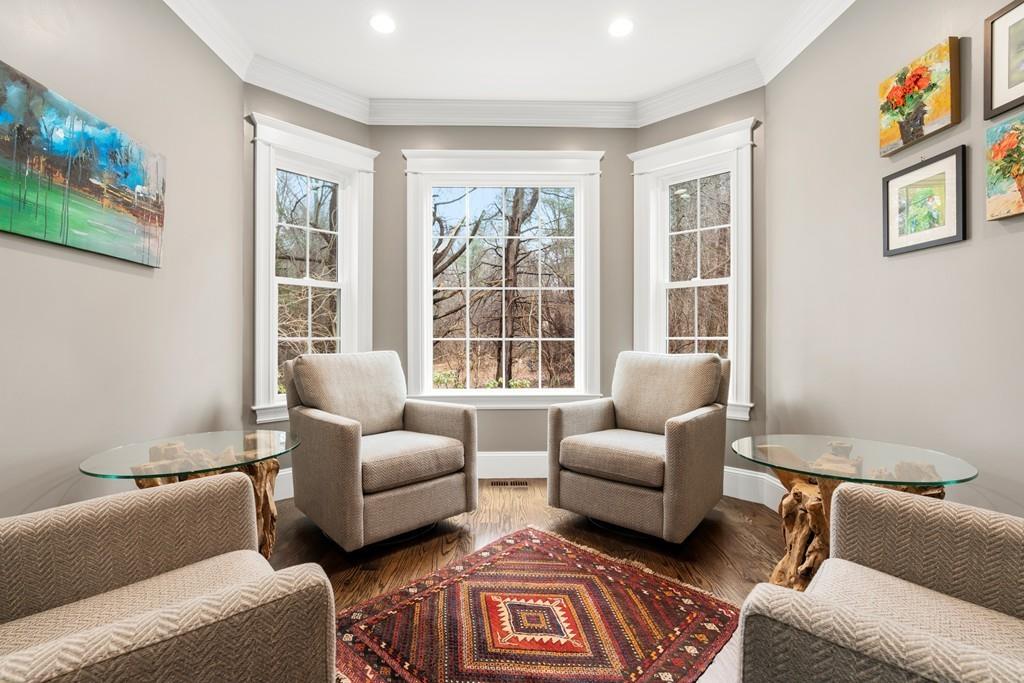18 Webb Avenue Wellesley, MA 02481 - Photo 9 of 19 a living room with furniture and a large window