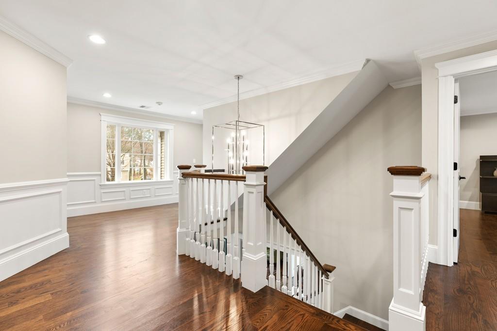 18 Webb Avenue Wellesley, MA 02481 - Photo 10 of 19 a view of front door and entryway with wooden floor