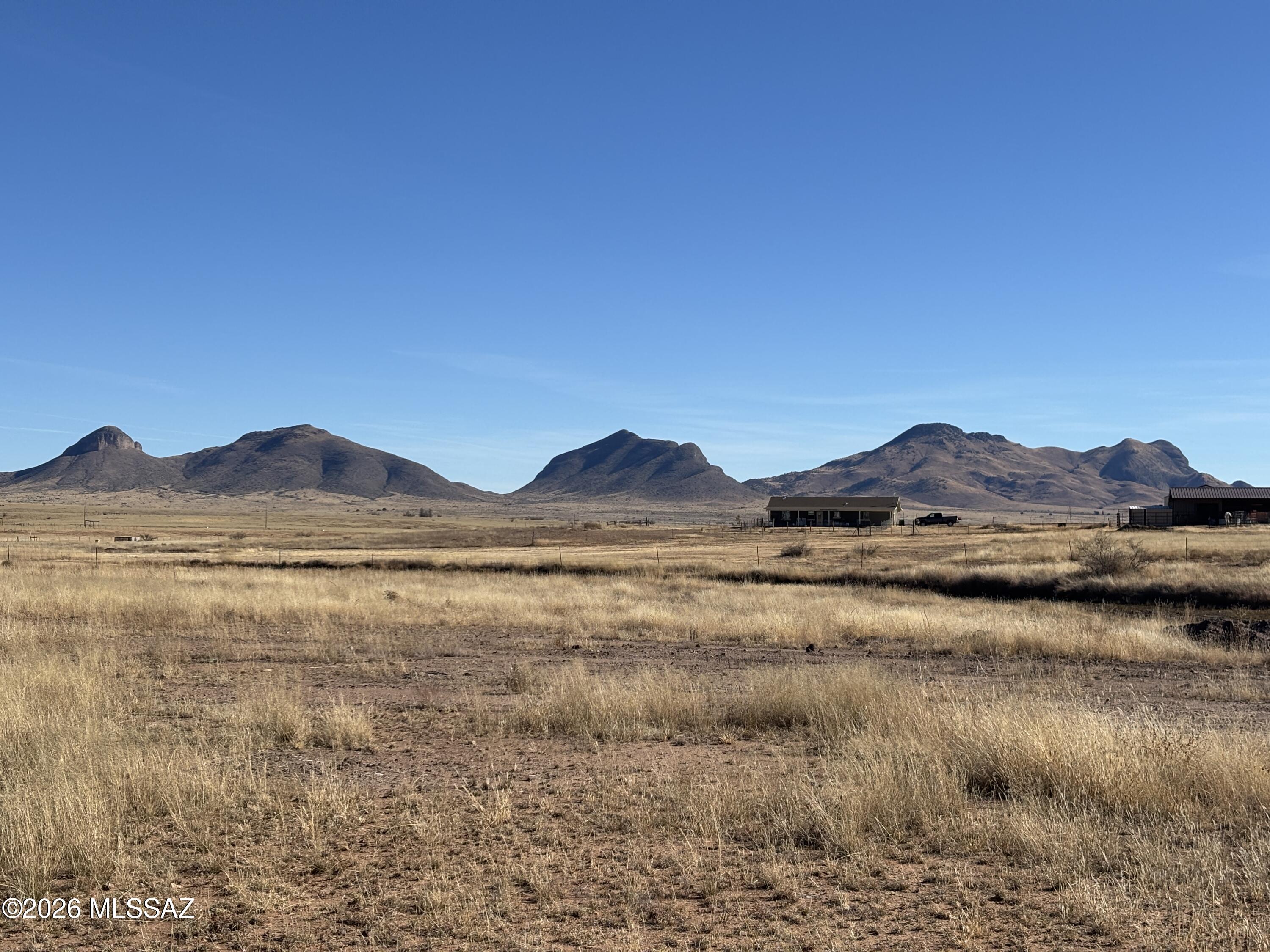 Elgin Road, Unit 1 Elgin, AZ 85611 - Photo 2 of 19 a view of an ocean with a mountain