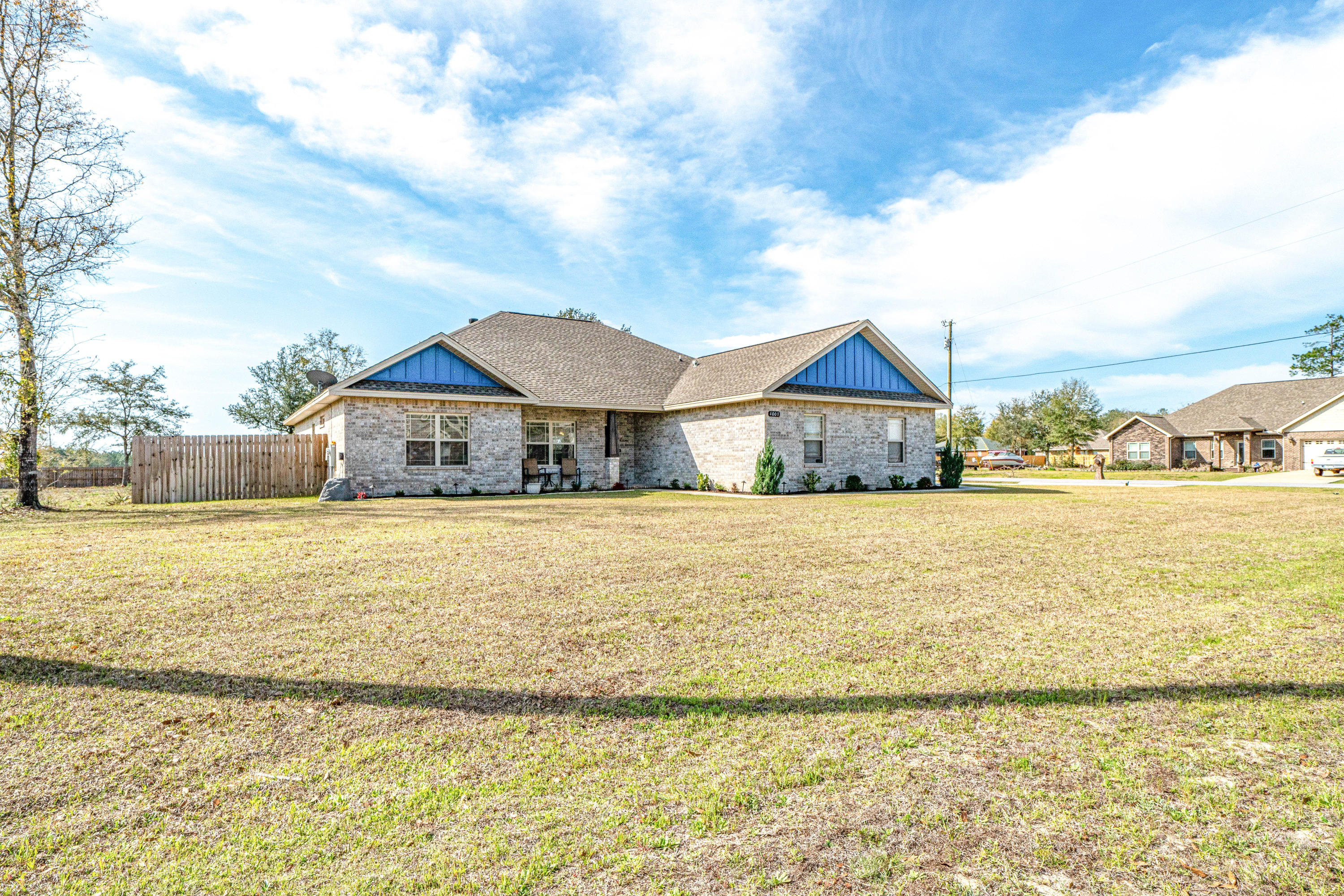 4008 Happy Trails Road Crestview, FL 32539 - Photo 3 of 32 a front view of house with ocean view