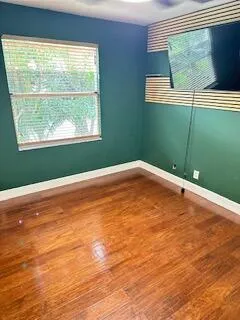 a view of a room with a large window