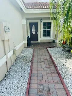 a view of a backyard of the house