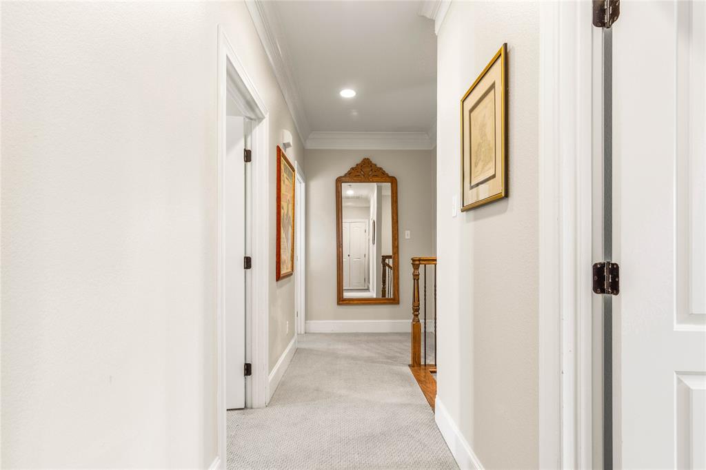 40 Enclave Court Waco, TX 76708 - Photo 19 of 40 a view of a hallway with wooden floor