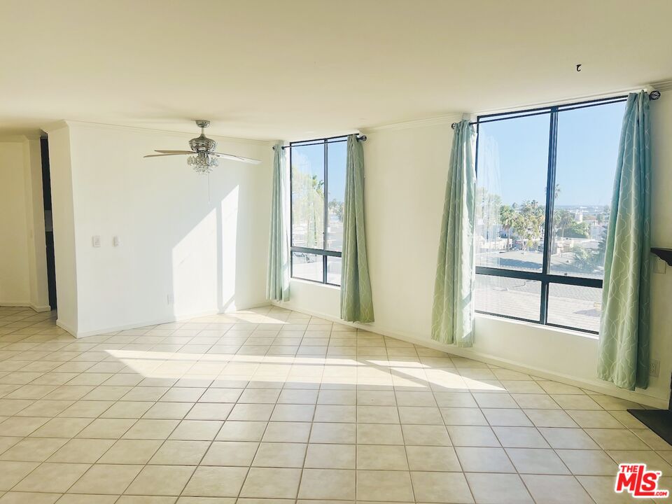7320 Hawthorn Avenue, Unit 222 Los Angeles, CA 90046 - Photo 16 of 33 a view of an empty room with window