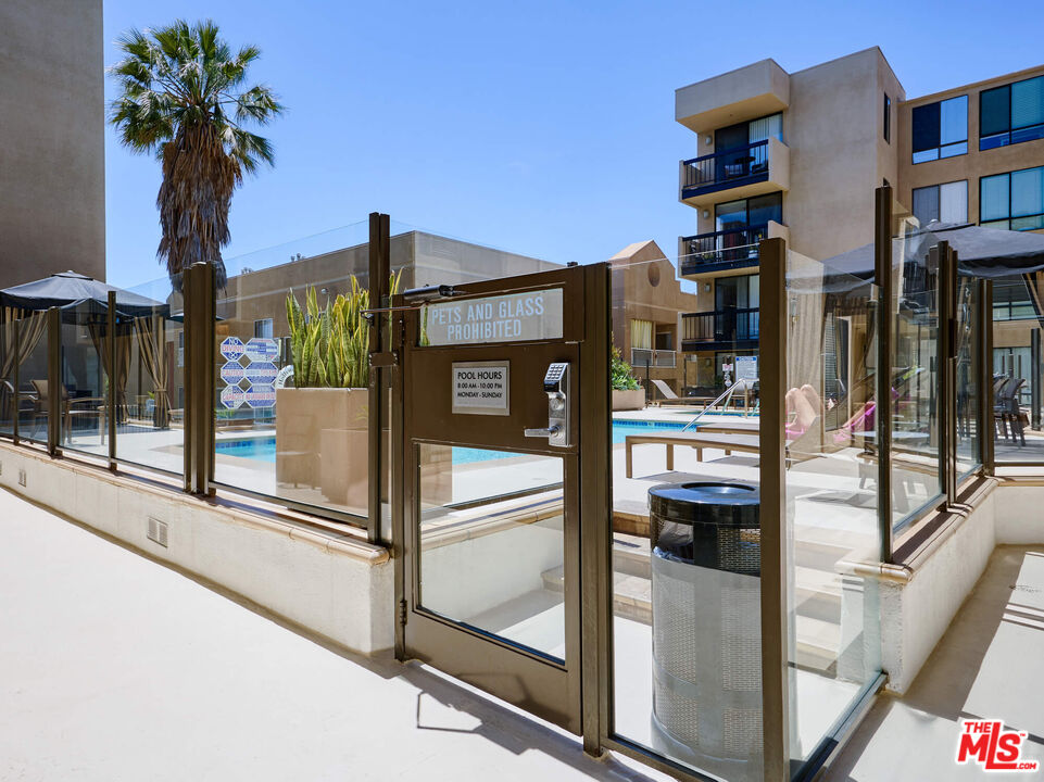 7320 Hawthorn Avenue, Unit 222 Los Angeles, CA 90046 - Photo 27 of 33 a potted plant in front of a building