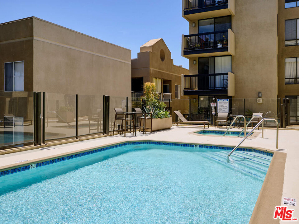 7320 Hawthorn Avenue, Unit 222 Los Angeles, CA 90046 - Photo 29 of 33 a view of a building with many windows