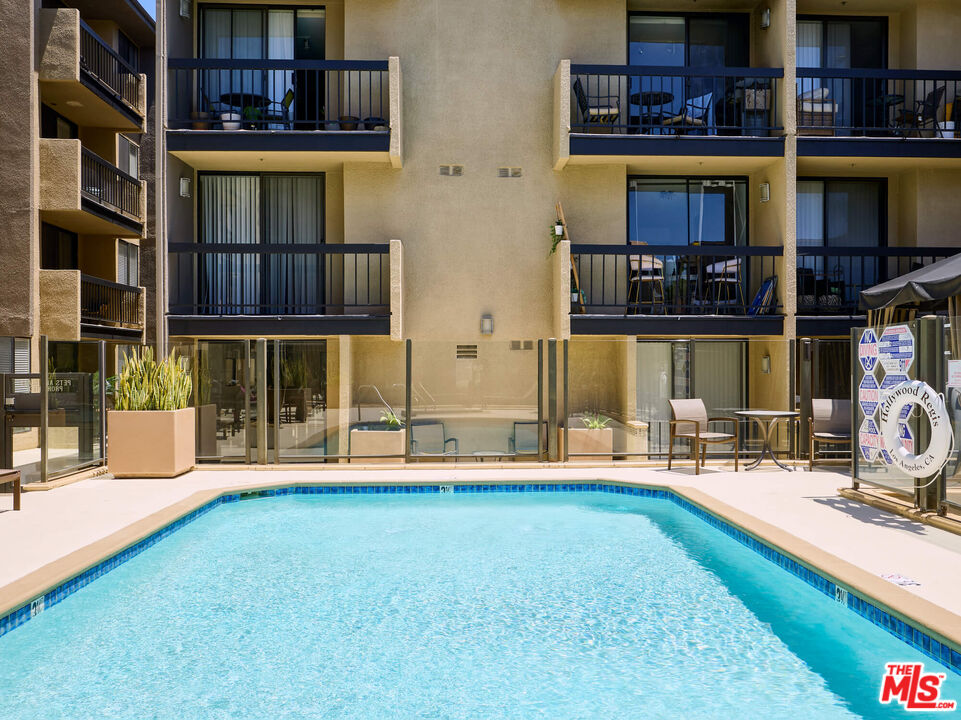 7320 Hawthorn Avenue, Unit 222 Los Angeles, CA 90046 - Photo 30 of 33 a house view with outdoor space