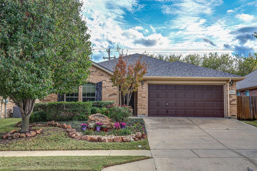 2632 Triangle Leaf Drive Fort Worth, TX 76244 - Photo 1 of 1 a front view of a house with a garden